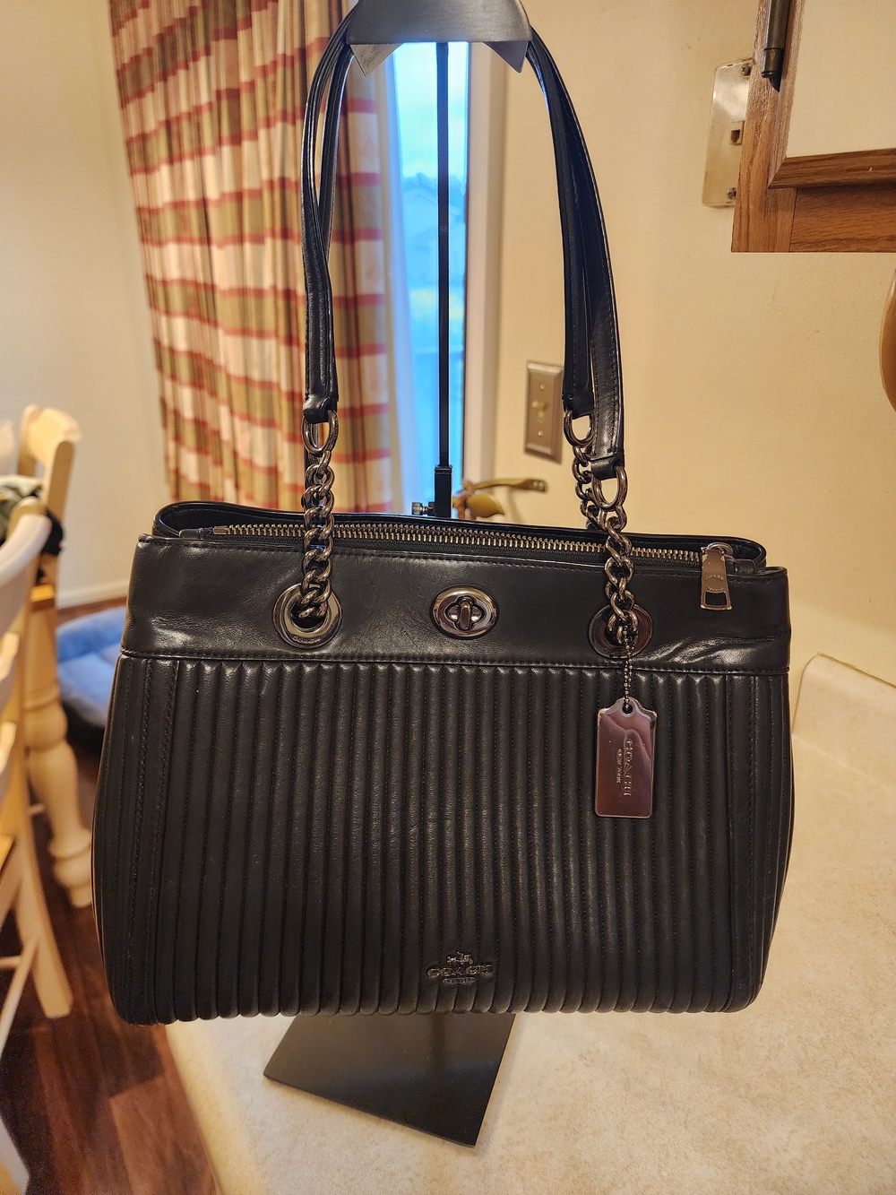 black Coach Turnlock Edie Carryall with Quilting vertical channel quilting